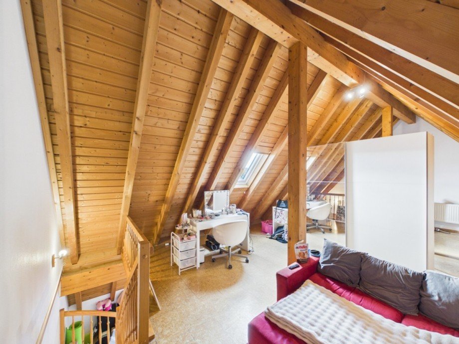 Wohnzimmer OG Dachgeschosswohnung Sinsheim